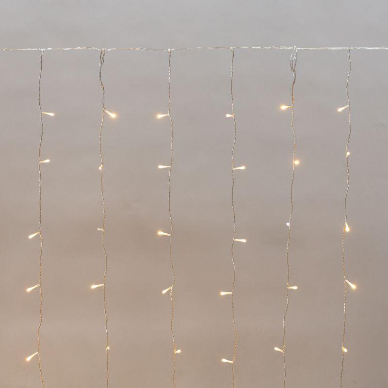 Гирлянда светодиодная "Светодиодный Дождь" 2х1.5м 150LED тепл. бел. 5.1Вт 230В IP44 эффект мерцания прозр. провод Neon-Night 235-516