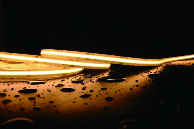 Лента светодиодная 10Вт/м 24В 3000K 12мм IP67 COB 480LED/м высокотемпературная (уп.5м) VARTON VLS-67-10-HT-12-480-30