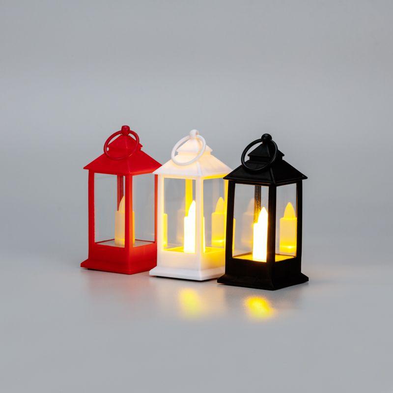 Набор из 3 фонарей со свечкой 5.5х5.5х12.5см тепл. бел. 3хLR1130 корпус бел. красн. черн. Neon-Night 513-020