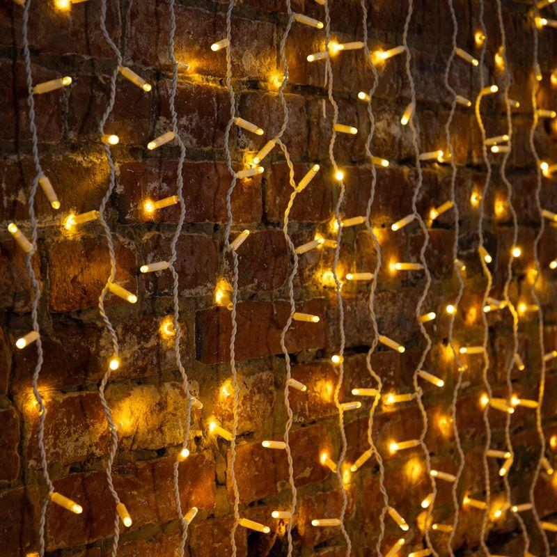 Гирлянда светодиодная "Светодиодный Дождь" 2х3м 448LED тепл. бел. 70Вт 230В IP65 эффект мерцания провод прозр. (нужен шнур питания 303-500-1) Neon-Night 235-136-6