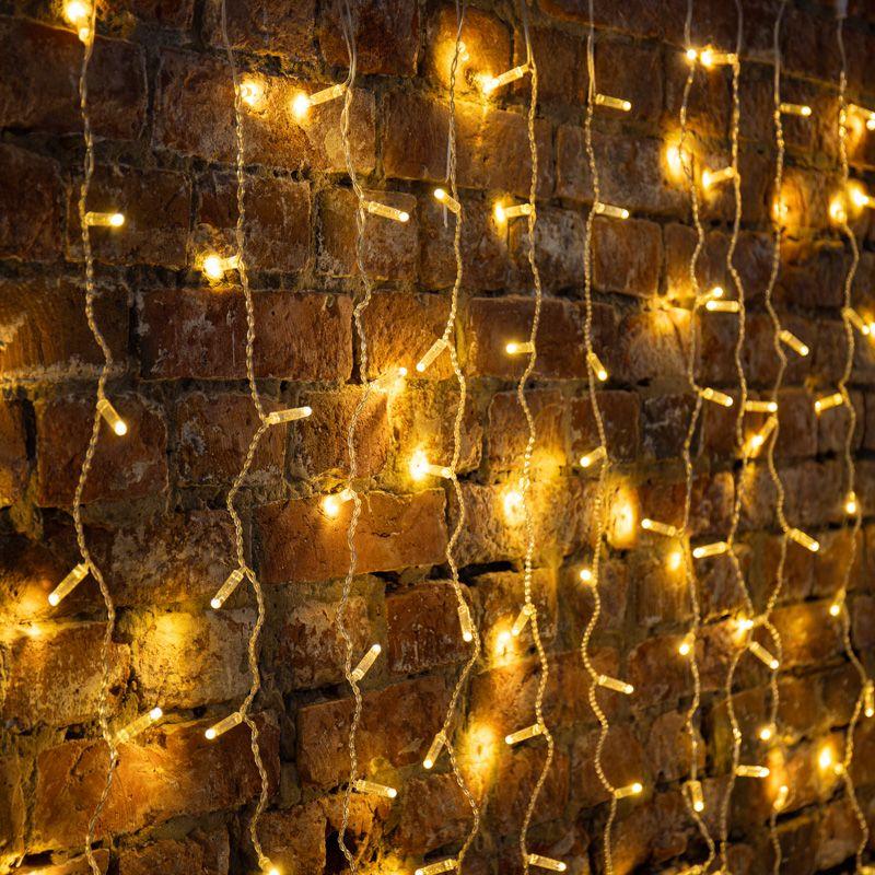 Гирлянда светодиодная "Светодиодный Дождь" 2х9м 2200LED тепл. бел. 110Вт 230В IP65 постоян. свечение провод силикон. прозр. Neon-Night 235-196
