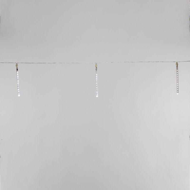 Гирлянда светодиодная "Тающая сосульки" 1.5м 4 сосульки х20см шаг 50см 4х14LED бел. 3.6Вт 230В IP20 с трансф. провод черн. Neon-Night 256-317-6